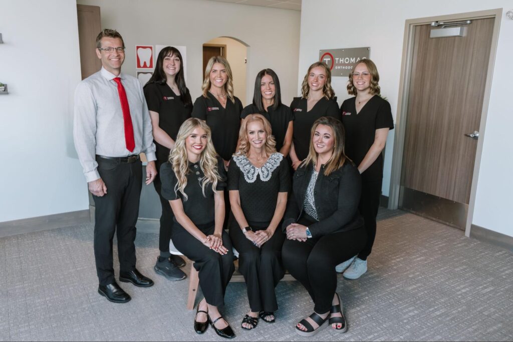 Orthodontist team posing together inside a Payson dental office